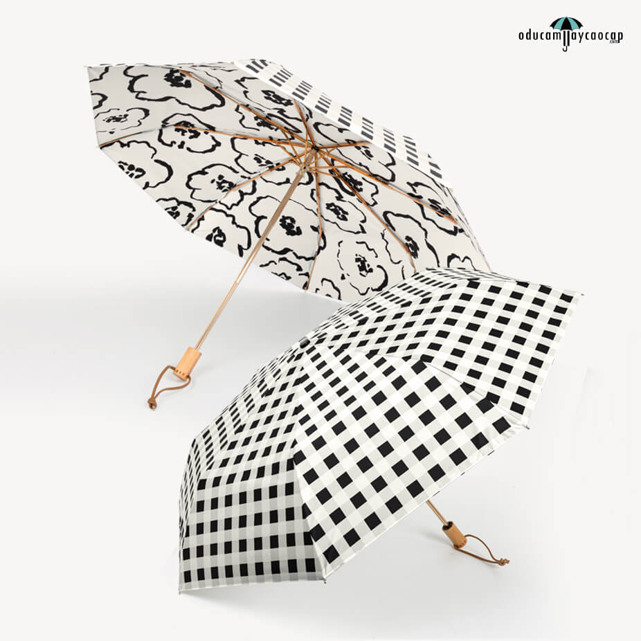 Một chiếc ô dù cầm tay màu trắng họa tiết Ink Flower tinh tế, sang trọng